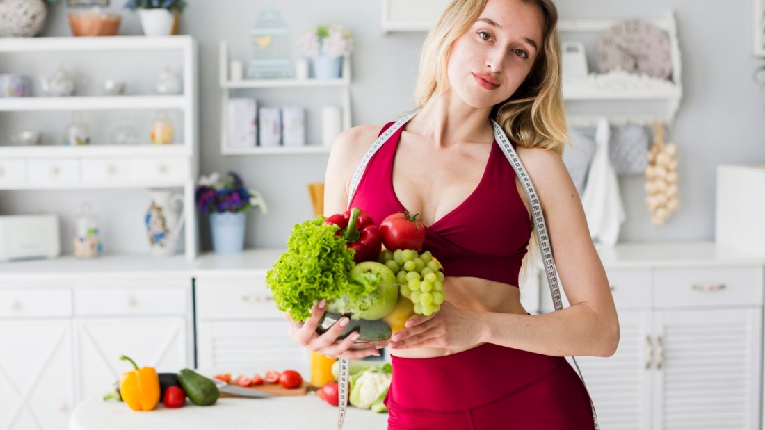 diet-concept-with-sporty-woman-kitchen_23-2148193187